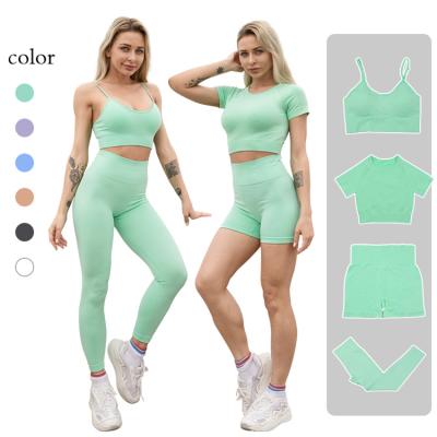 China 2021 Breathable Fashionable Women Short Sleeve Crop Leggings Top Activewear Yoga Outfits Two Piece Seamless Set for sale