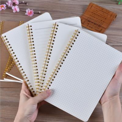 China Cheap Bulk Custom A5 Hardcover Dotted Journal Blank Notebook Wrapping Paper Spiral Recycled Notebook for sale