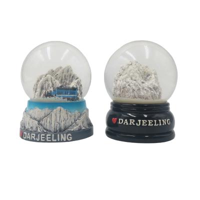 China Customized hot sales Europe polyresin water and snow mountain 65#snow mountain plastic water snow globe train globe accept OEM and ODM for sale