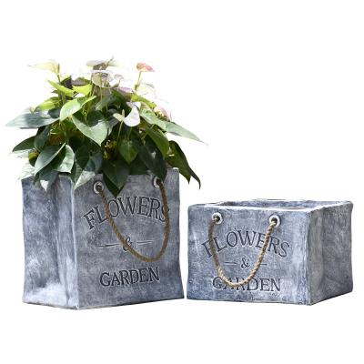 China Jeans Cowboy CLASSIC Polyresin Bag Flowerpot Square Flower Pot Van For Garden Statue for sale