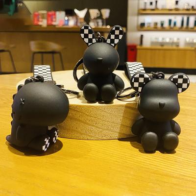 China Wholesale Modern Cartoon Creative Black Fresh Colorful Bear Doll Checkerboard Key Chain for sale