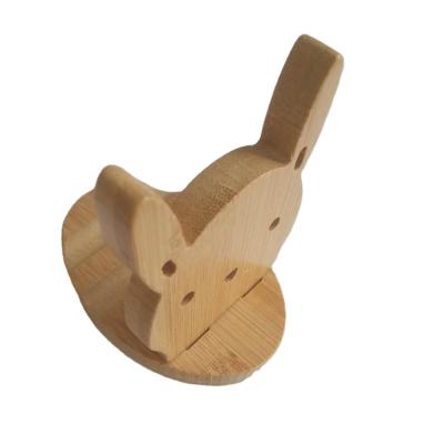 China Environmental protection mobile phone shelf cute bamboo shelf viable cartoon small animal bamboo mobile phone holder for sale