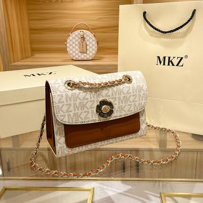 China 2021 Fashion Style Square French Antique Massager Tide Small Camellia Letters Hit Color Shoulder Bags PU Leather Strap Chain Bags for sale