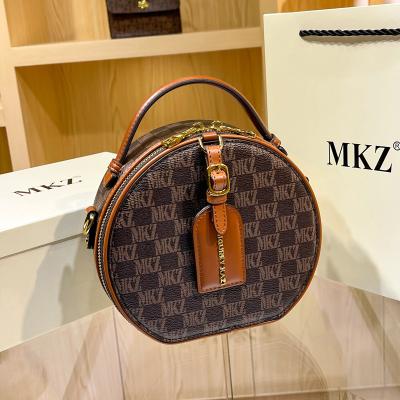 China 2021 Fashion Woman Designer Famous Brands Fashionable Luxury PU Leather Lady Round Handbags for sale