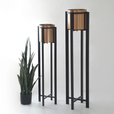 China 2021 Customs Wholesale Modern Black Home Decorative Iron Plant Pot Metal Frame Tall Flower Stand for sale