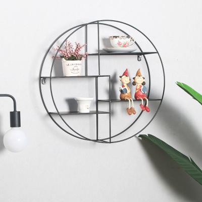 China Minimalist Black Metal Round Shape 4 Tier Decoration Corner Storage Wall Hanging Shelf for sale