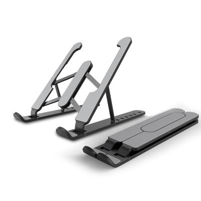 China Adjustable Foldable Plastic Notebook Stand (Height) ABS Portable Desktop Laptop Stand Riser Stand Support for sale