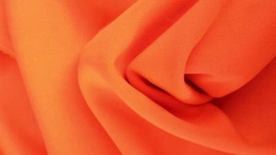 China Waterproof Jersey Air Layer Fabrics For Dress , Orange 4 and 2 way Stretch Knit Fabric for sale