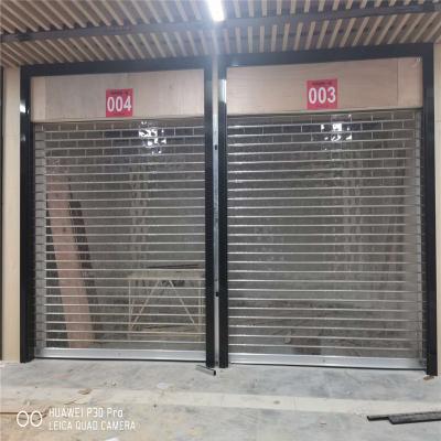 China Waterproof Polycarbonate Transparent Roller Shutter Door for shop for sale