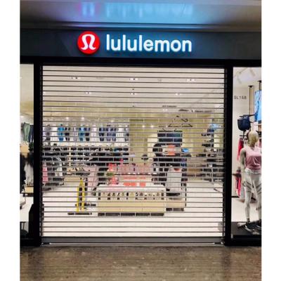 China Anti-Theft Factory direct sale polycarbonate transparent roller shutter door for mall for sale