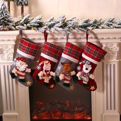 China Christamas Home Decor Christmas Plaid Doll Big Bumps Christmas Knit Stocking Decorations Kids Candy Bumps Gift Bag for sale