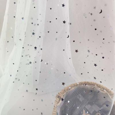 China New Design Blue Color Star And Moon Tulle Fabric Tutu Tulle Roll Anti-Static for sale