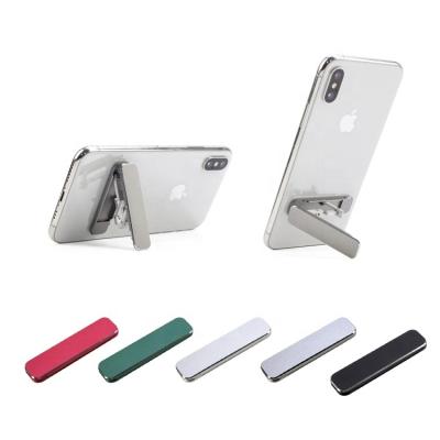 China Aluminum Alloy Adjustable Universal Stand Holder Portable Vertical Foldable Phone Desk Stand for sale