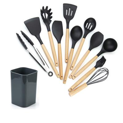 China Kitchen Sustainable Utensils Set 12Pcs Non-Stick Silicone Cooking Tool With Stand Handle Heat Resistance Silicone Sturdy Wooden Spatula for sale