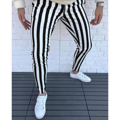 China Polyester/Cotton Men's Slim Fit Small Foot Casual Pants Striped Elastic Tight Pants Fashion Plaid Pants Men for sale