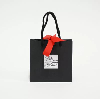 China Recycled Materials Custom Printed Paper Bags For Shopping Paper Bags Custom Logo for sale