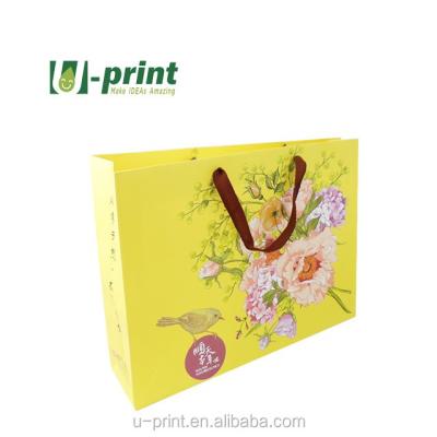 China Recyclable Custom Party Shopping Glossy Paper Gift Bags With Handles for sale