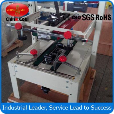 China FXJ5050 semi auotmatic carton box taping sealing machine for sale