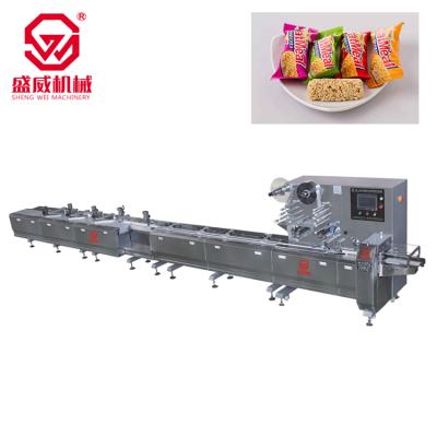 China Chemical full automatic packing line for nut/log/hamburger chips it can be equipped with coding device and air filling device for sale