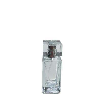 China Non Spill Luxury Empty Refillable Square 30ML Hot Selling Transparent Glass Perfume Bottle for sale