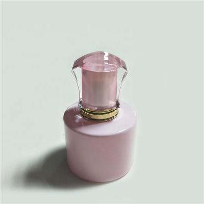 China Round Shape 50ml Cosmetic Wholesale Clear Perfume Glass Refillable Spray Bottle With Cap for sale