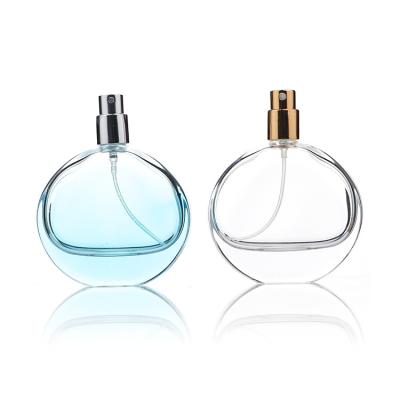 China 50ml 50 mll 50 ml perfume glass bottle flat round blue color cheap luxury cosmetic gradient clear empty packaging with box bottom moq for sale