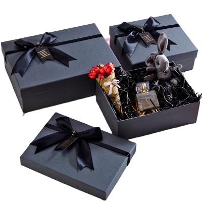 China Recyclable Custom Luxury Black Cardboard Paper Wedding Gift Box Packaging With Ribbon for sale