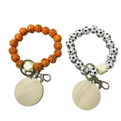 China Fashionable Wooden Beaded Bracelet Printing Baseball Volleyball Promotion Gift Amazon Design Monogram Disc Bracelet Key Chain Key Rings for sale