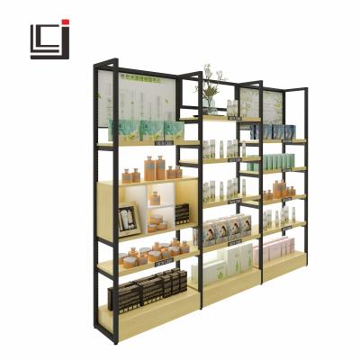 China Cosmetics shop display rack beauty care shelf low price steel-wood structure cosmetic shelf display for sale