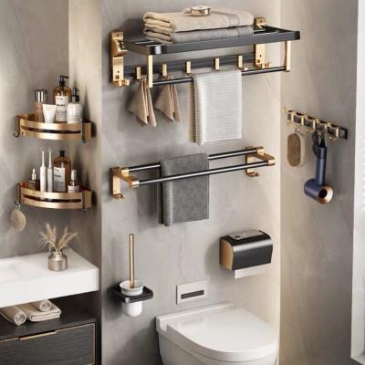 China Sustainable MU hot sales Aluminum Folding Storage Rack Hardware Accessories Set Black And Gold Towel Rack Shelf Bathroom Products for sale