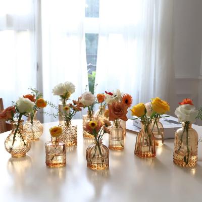 China Art Deco MU hot sales Glass Bud Vases Set Small Amber Bud Vases In Bulk Mini Vintage Decorative Bottles Modern Floral Centerpiece For Flo for sale