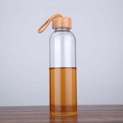 China Yunxi 2020 Hot Sell Sustainable Sports Bamboo Water Bottle Cap Reusable Eco Friendly Glass Water Bottle Drinking White With Custom Logo for sale