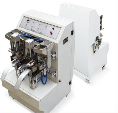 Chine Factory price factory price four heads double paper bag heads supply eyelets machine for sale à vendre