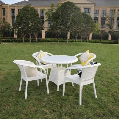 China Weather-protection Cheap Plastic Furniture Rattan Glass Patio Around Garden Outdoor Dining Table Set for sale