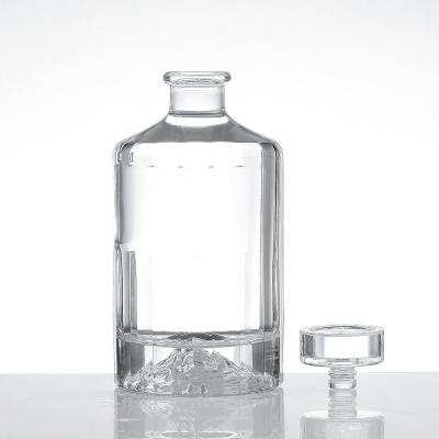 China 150ml Beverage Short Neck Flat Mouth Small Capacity Transparent Vodka Glass Bottle With Embossed Exquisite for sale