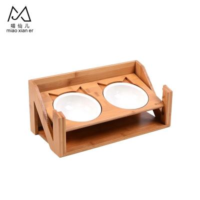 China Sustainable N Shaped Bamboo Wooden Pet Feeder With Two Pet Ceramic Bowl For Cat Dog Supplies for sale