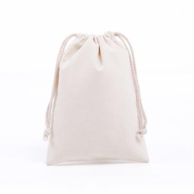 China Excellent Eco-Friendly Reusable Organic Pouch Bag Reusable Organic Cotton Drawstring Cotton Drawstring Pouch Suction Muslin Drawstring Printed Bag for sale