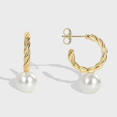 China Environmentally Friendly Personality Good Big C-Shaped Pearl Shell Pearl Gold Plated Twist Earrings Jewelry Earrings Women for sale