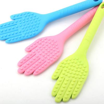 China Handheld Plastic Hand Body Massager Hand Massager Tool Silicone Pad Portable Palm Pat Clap for sale