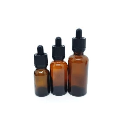 China Essential Oil Container 5ml 10ml Clear/Amber/Frosted Glass Bottle 30ml 50ml Glass Liquid Dropper Bottle With Gold Cap For Aroma Perfume Oil for sale