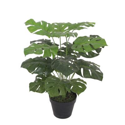 China Contemporary Tropical Faux Leaf Split Tree Artificial Plant With Plastic Nursery Pot for sale