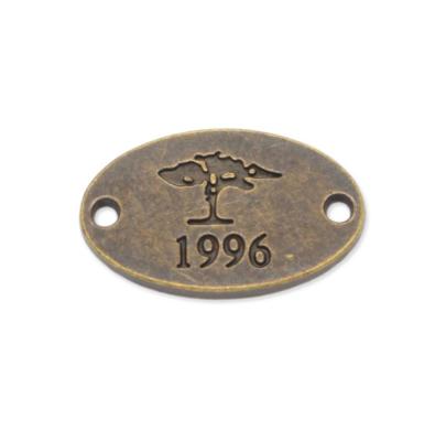 China Custom Europe Metal Tags For Clothing Garment Brand Tags Metal Sewing Tags In High Quality for sale