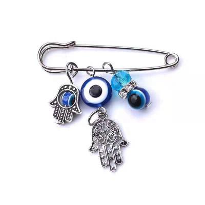 China HOT Metal Evil Eye Brooch Contracted Palm Owl Alloy Brooch Fashion Blue Crystal Evil Eye Brooch for sale