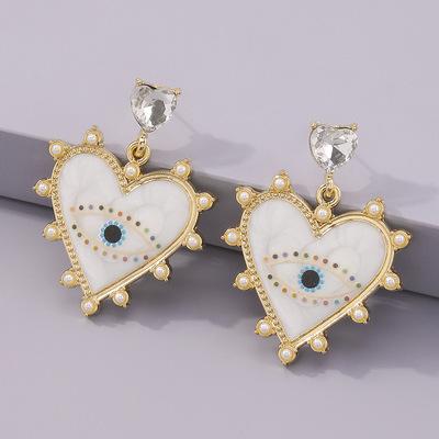 China Hot Sale Women Personality ExaggerateOil Fashionable Drip Heart Dangle Earrings Rhinestone Crystal Love Heart Evil Eyes Drop Enamel Earring for sale