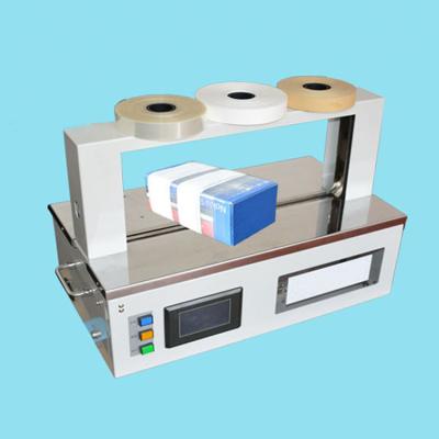 China Automatic Opp Paper Tape CLOTHING Strap Banding Machine for Banknote Money Cash for sale