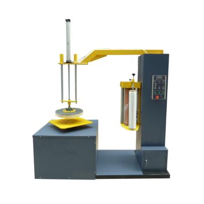 China Mini CLOTHING Wrapping Machine and Mini Small Carton Box Stretch Wrapping Machine Film Wrapping Machine for sale