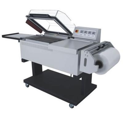 China APPAREL Film Shrink Wrapping Machine Wrapping Machine 2 in 1 Automatic PVC Film Heat Shrink Wrapping Machine for sale