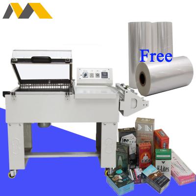 China GARMENT shrink wrap machine for books shrink 2 in 1 one step shrink wrap machine shrink packaging system for sale