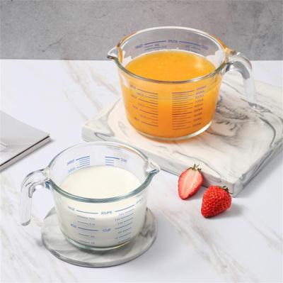 China Factory Wholesale Creative Microwave Borosilicate Glass Clear Stored Safe Measuring Cups Tall With Handle for sale