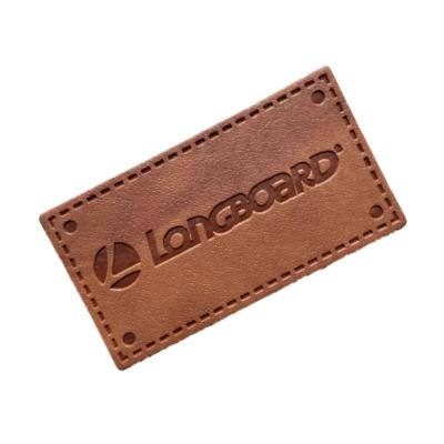 China Best price custom screen washable custom leather taggs patch for garment embossed PU leather labels for sale